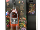a bottle of whisky with a floral design on the front