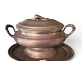 an image of a silver plate with a bowl and saucer on it