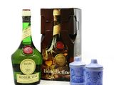 a bottle of alcohol next to a canister and a box
