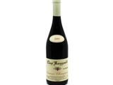 a bottle of wine that is sitting on a table