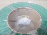 a picture of a spool with a piece of paper in it