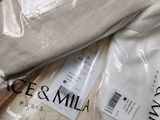 a lot of clothes that are wrapped in plastic bags