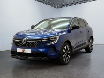 a blue car is parked in a white room with a black floor