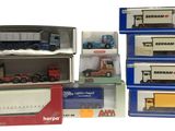 many different types of toy trucks in the boxes