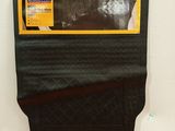 a picture of a piece of black material hanging on a wall