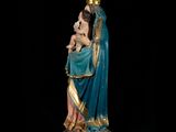 a statue of a woman holding a baby in her arms