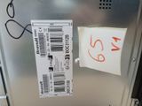 a sticker on the door of a refrigerator that has a price tag attached to it