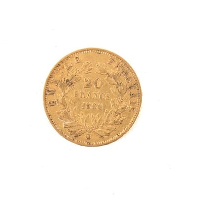 une image d'une pièce d'or sur une surface blanche avec un fond blanc