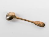 a spoon that is sitting on top of a table