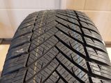a close up of a tire on a wooden floor