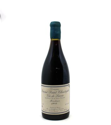 a bottle of wine that is sitting on a table