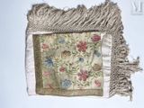 a picture of a piece of cloth with a bird on it