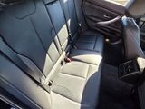 a picture of a car with a black leather seat