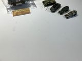 a box of military vehicles sitting on a table