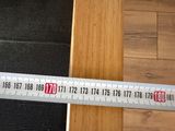 a measuring tape that is on the side of a door
