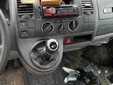 a dashboard of a car with a bunch of items in it