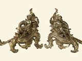 pair of antique brass figurines of a man and a woman on a horse