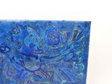 a painting of a blue bird on a blue background