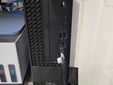 a desktop computer that is connected to a power strip