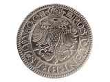 a close up of a silver coin with an eagle on it