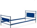 the bed frame is made of metal and has a blue cover