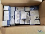 many boxes of electronic devices in a cardboard box