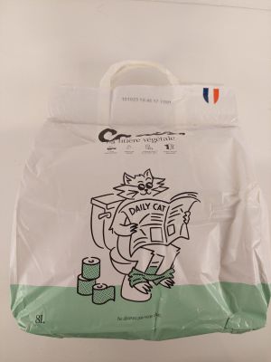a paper bag with a drawing of a cat reading a newspaper