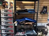 a room with a lot of items and tools on the shelves