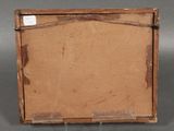 an old picture of a piece of wood with a piece of paper on it