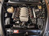 an image of a car engine with its hood open