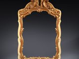 an ornate gold frame on a black background