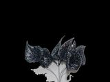 a black and white picture of a flower with glitter on it