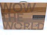 a box that is sitting on a table with the words wow the world written on it