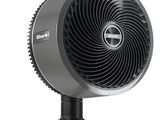 a black and silver fan sitting on top of a metal stand