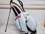 a golf bag that is sitting on a table