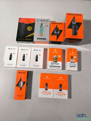 several boxes of electronic devices sitting on a table