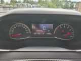 a close up of a car dashboard with various gauges
