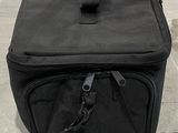 a black bag that is sitting on the floor