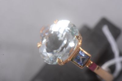 a close up of a ring with a stone in it