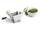a small bowl of parsley and a small bowl of parsley on a white surface