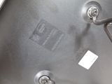 a close up of a metal object with a tag on it