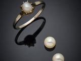 a pearl and gold ring and earring set