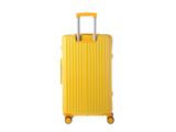 the yellow suitcase is sitting on wheels on a white surface