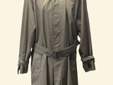 a picture of a trench coat on a mannequin
