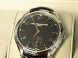 a watch that is in a box on the table