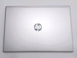 a laptop that is sitting on a white table