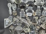 a lot of glass objects that are on a table