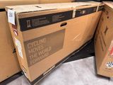 many boxes stacked on top of each other on the floor