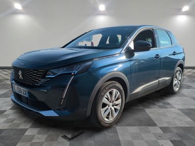 a blue 2021 peugeot suv parked in a room with checkered floor