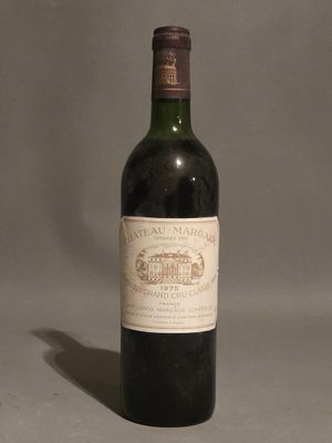 a bottle of wine that is sitting on a table